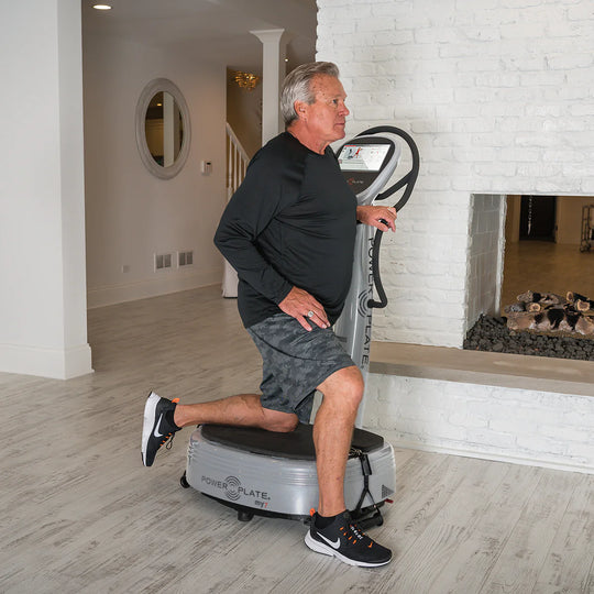 Man using Silver Power Plate® my7™ in a home setting